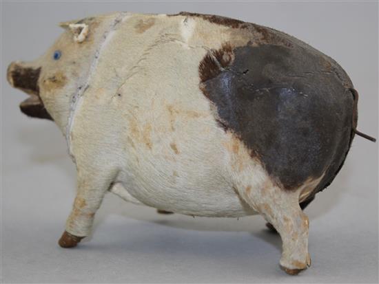 An early 20th century musical pig, probably French, 5.5in.